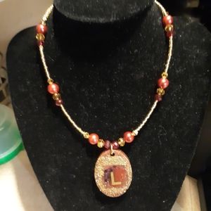 Personalized red and Gold necklace.
